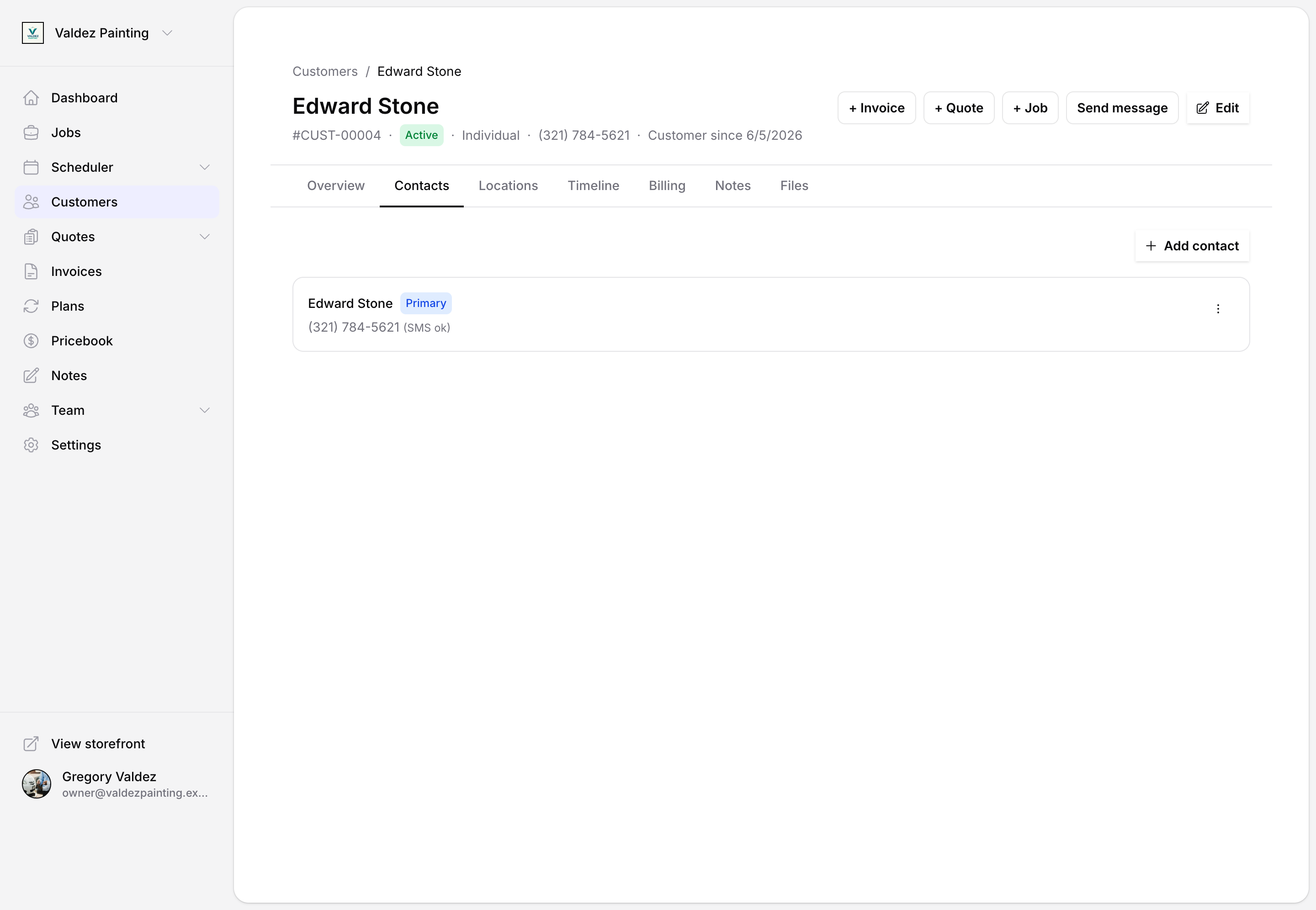 The customer Contacts tab showing the primary contact and its phone number